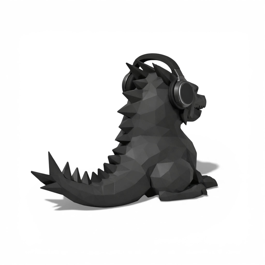 Happy3dWorld black geometric dragon headphone stand with a low-poly 3D printed design holding gaming headphones.