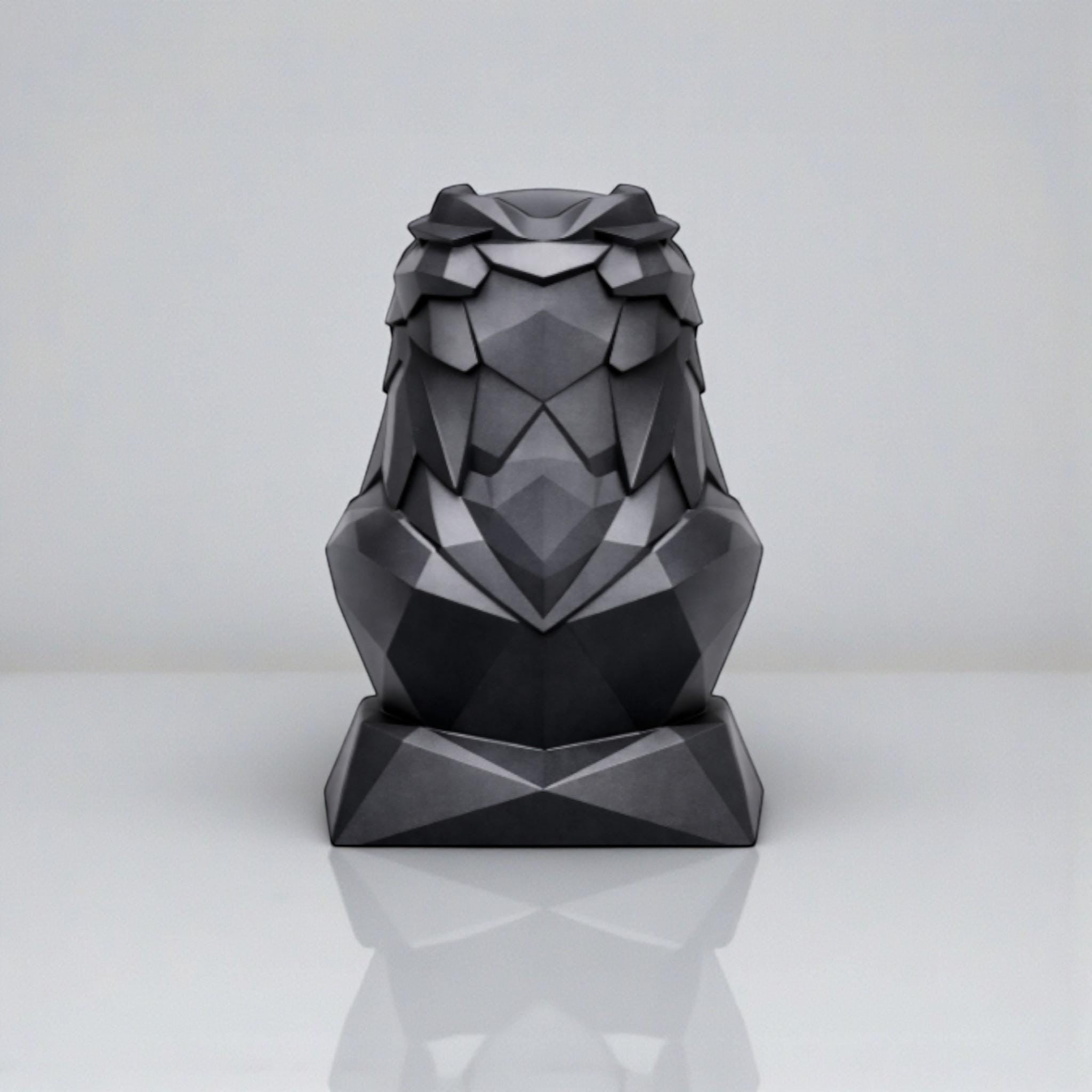 Happy3dWorld black geometric eagle headphone stand with a matte low-poly faceted design for desk organization.