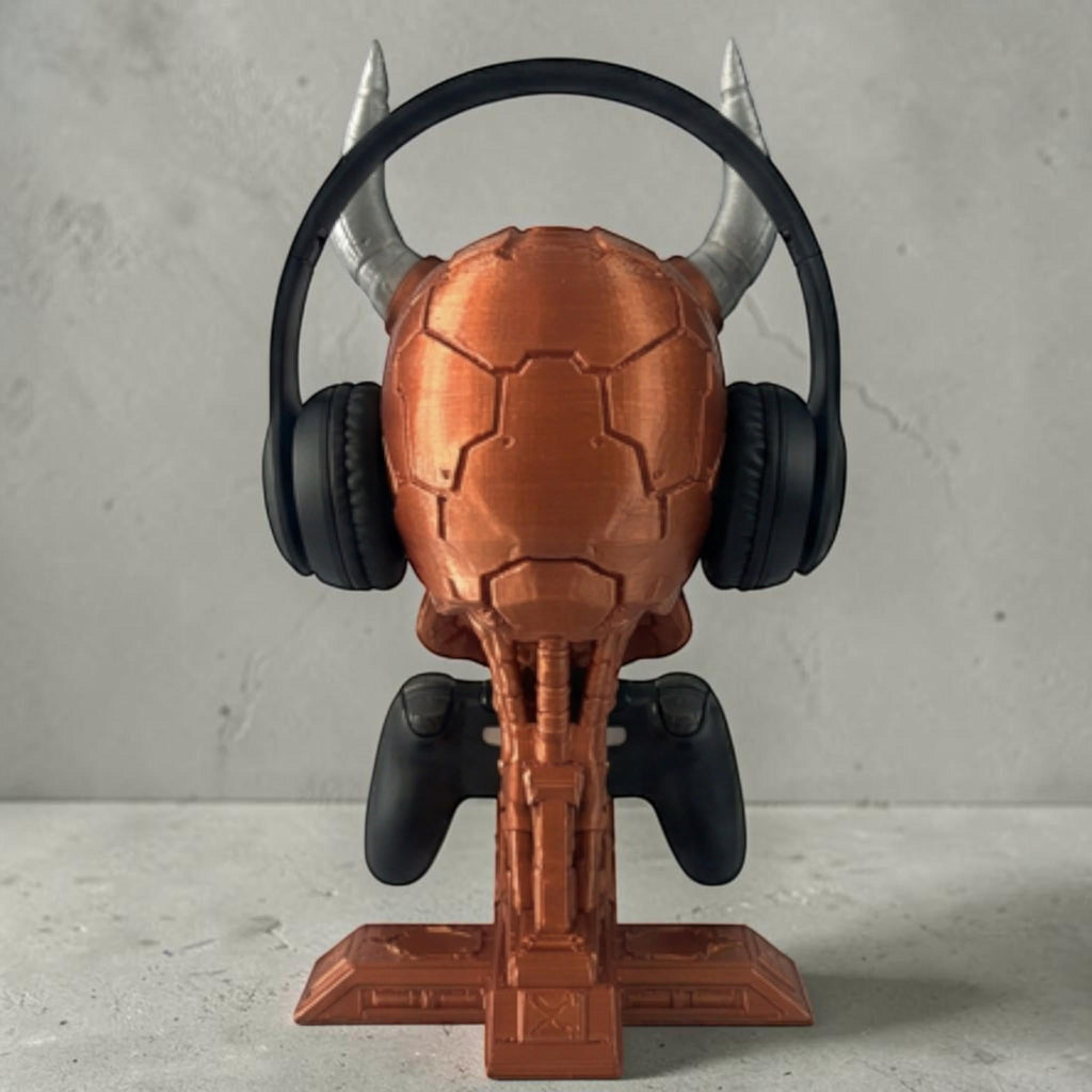 Happy3dWorld copper cyberpunk skull headset and controller stand with silver horns holding gaming gear on a desk