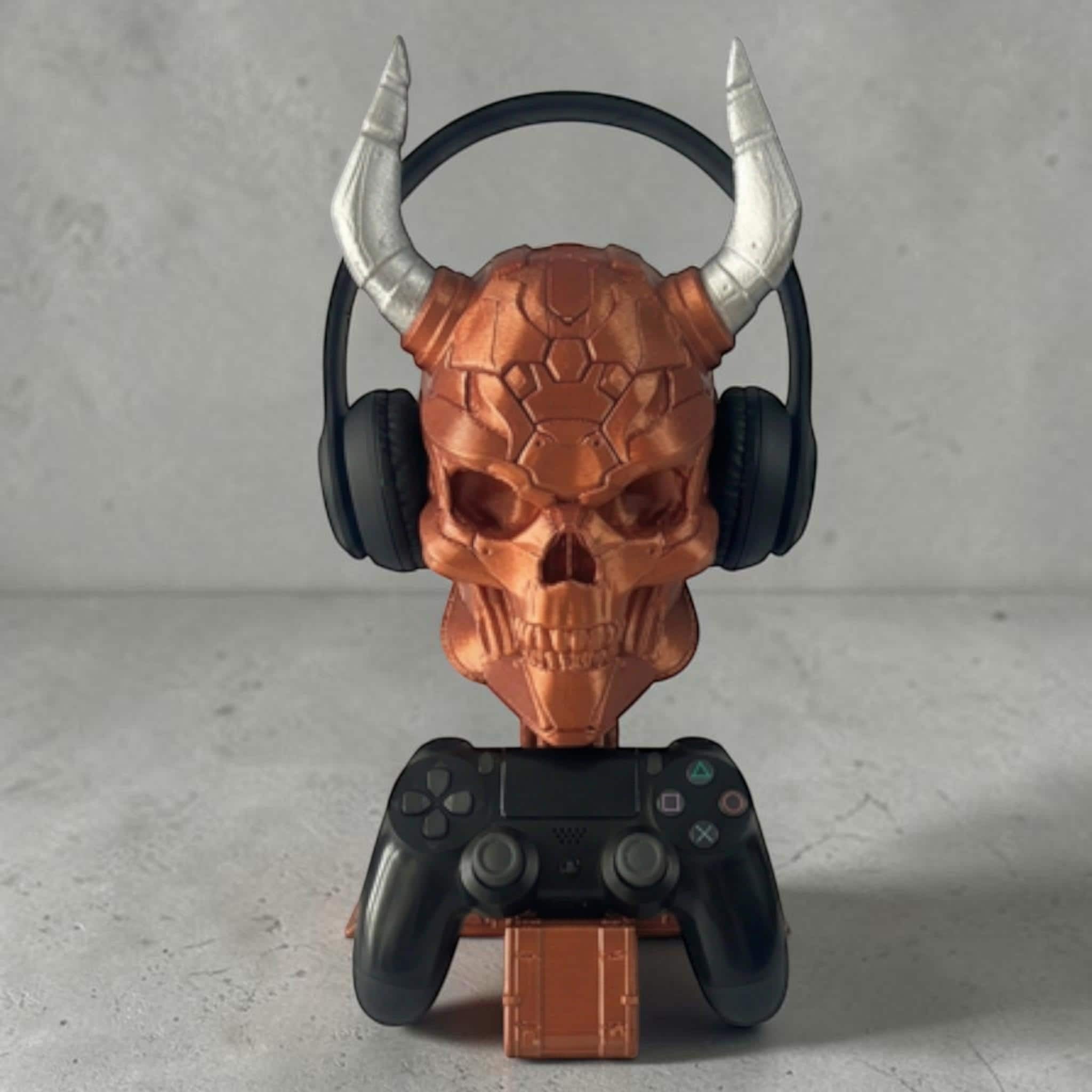 Happy3dWorld copper cyberpunk skull headset and controller stand with silver horns holding gaming gear on a desk
