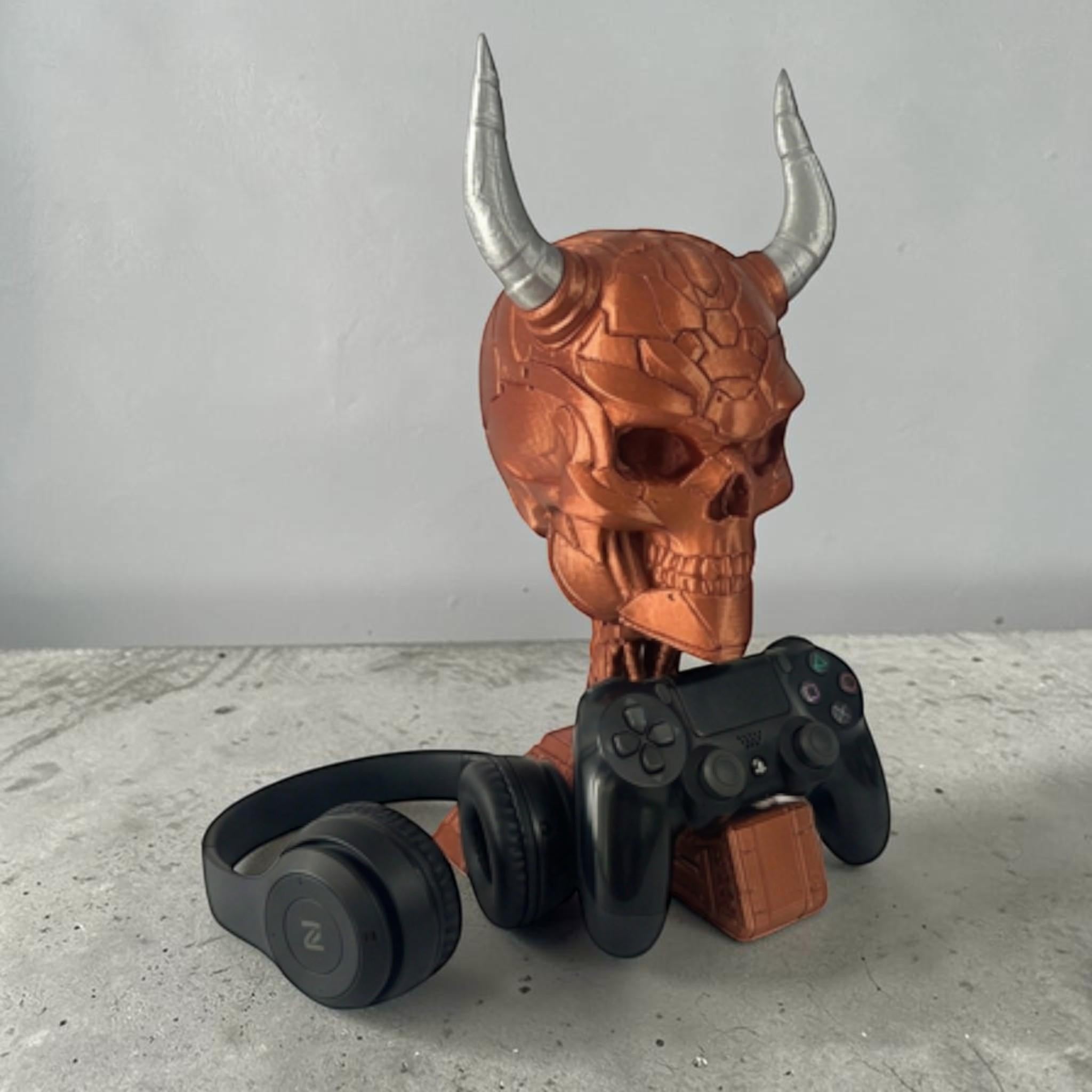 Happy3dWorld copper and silver 3D printed cyberpunk skull headset and controller stand on a concrete surface
