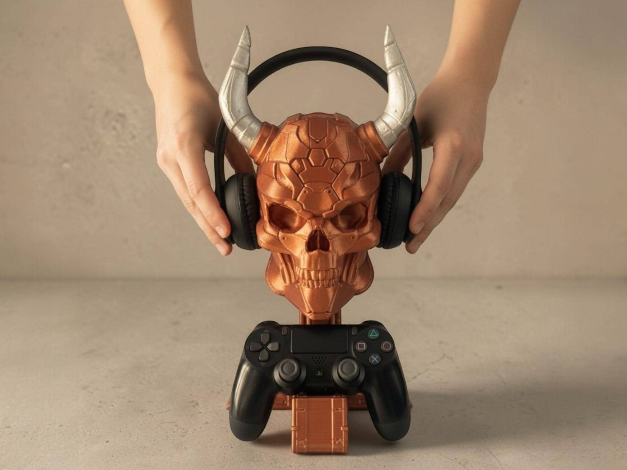 Happy3dWorld copper cyberpunk skull headset and controller stand held by hands on a neutral background