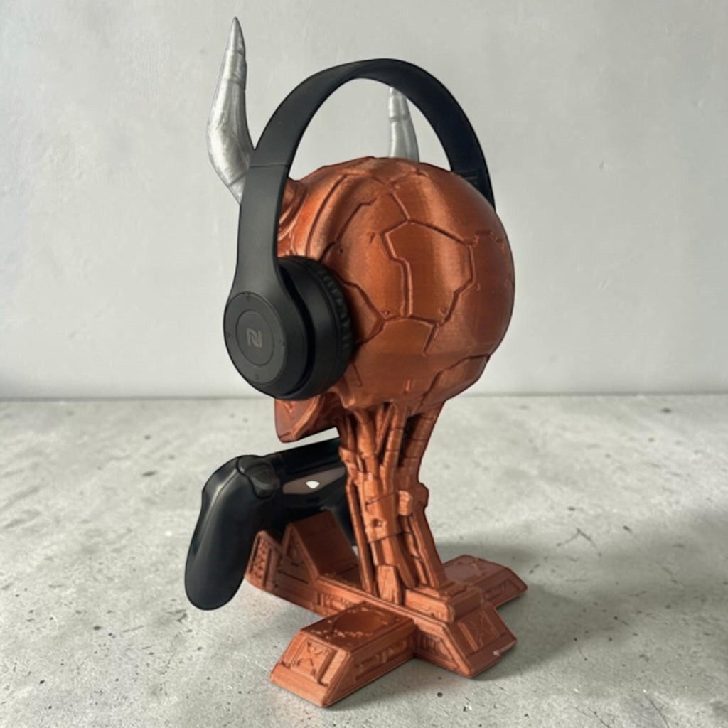 Happy3dWorld cyberpunk skull headset and controller stand in metallic copper with silver horns holding gaming gear