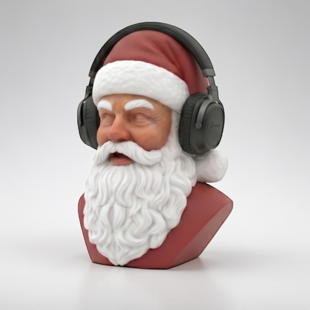 Happy3dWorld 3D-printed Santa bust wearing black over-ear headphones, featuring red and white PLA desk decor.
