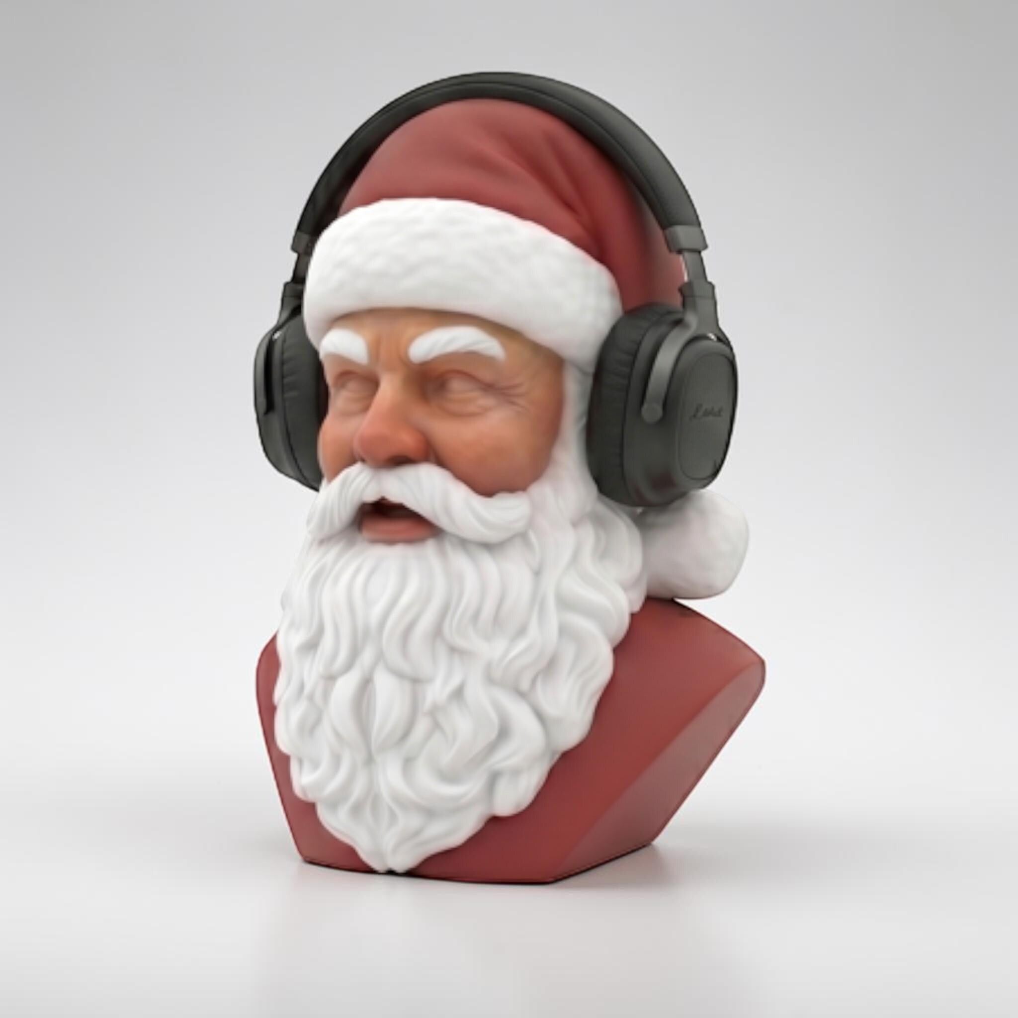 Happy3dWorld 3D-printed Santa bust wearing black over-ear headphones, featuring red and white PLA desk decor.