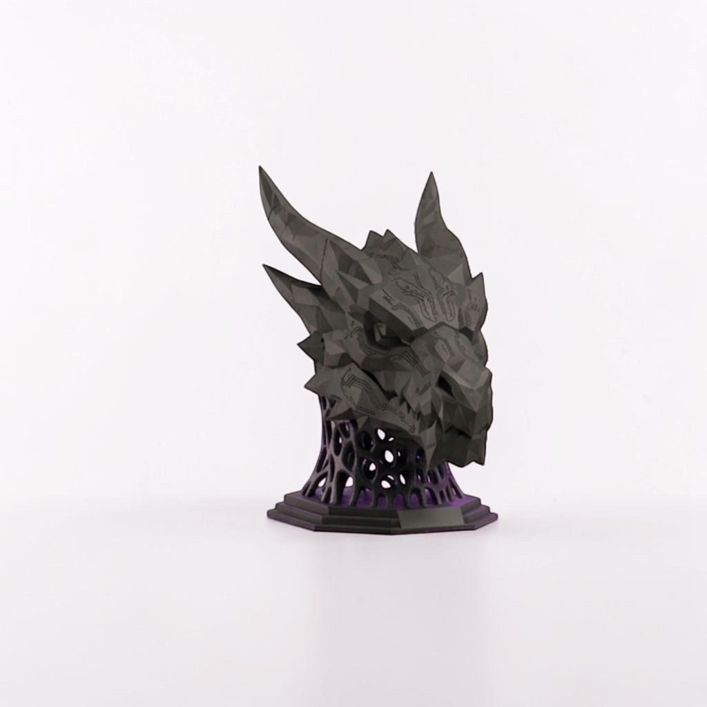 Happy3dWorld matte black 3D printed dragon headset stand with geometric low-poly design and purple lattice base.