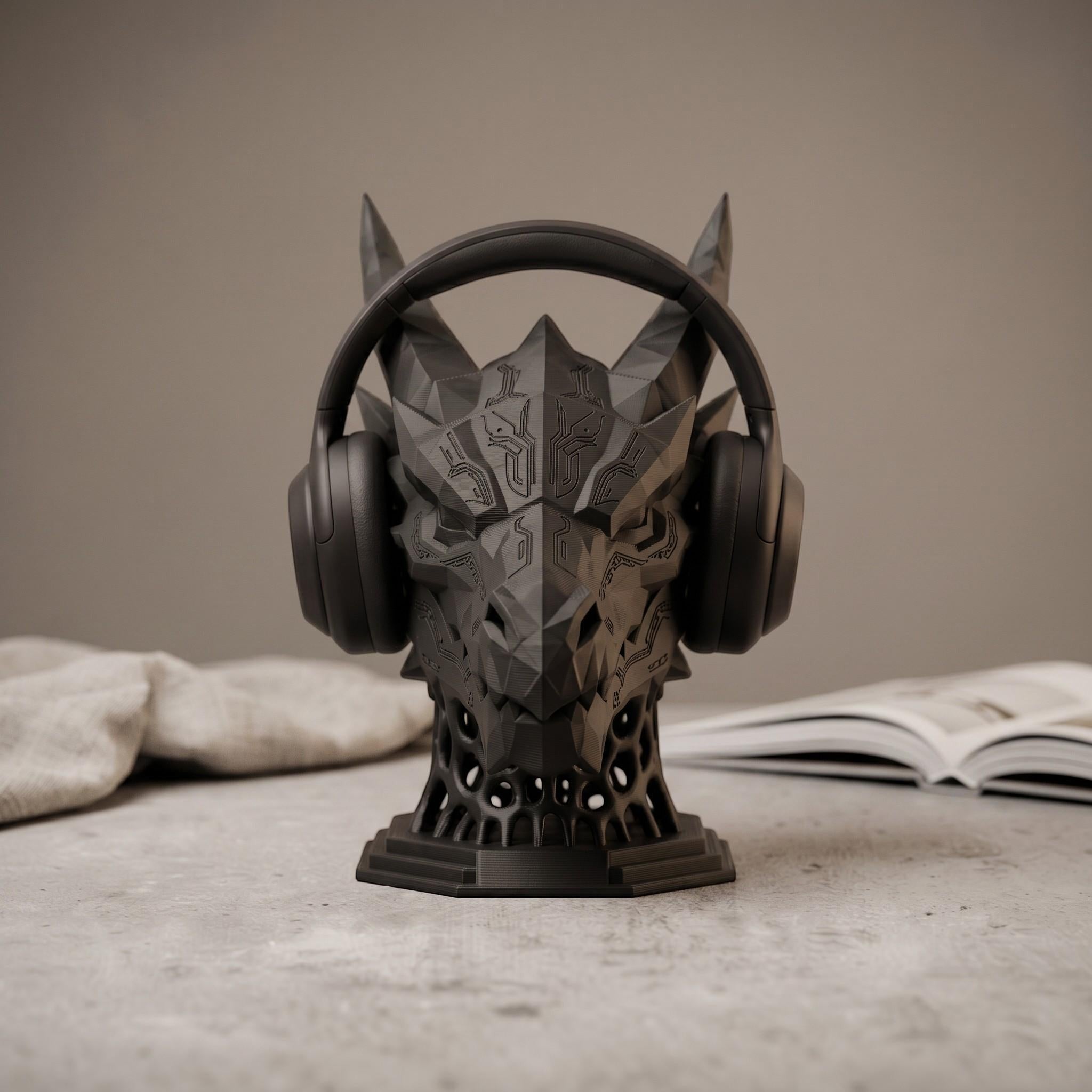 Happy3dWorld matte black 3D printed dragon headset stand with geometric cyber-mech design holding gaming headphones.