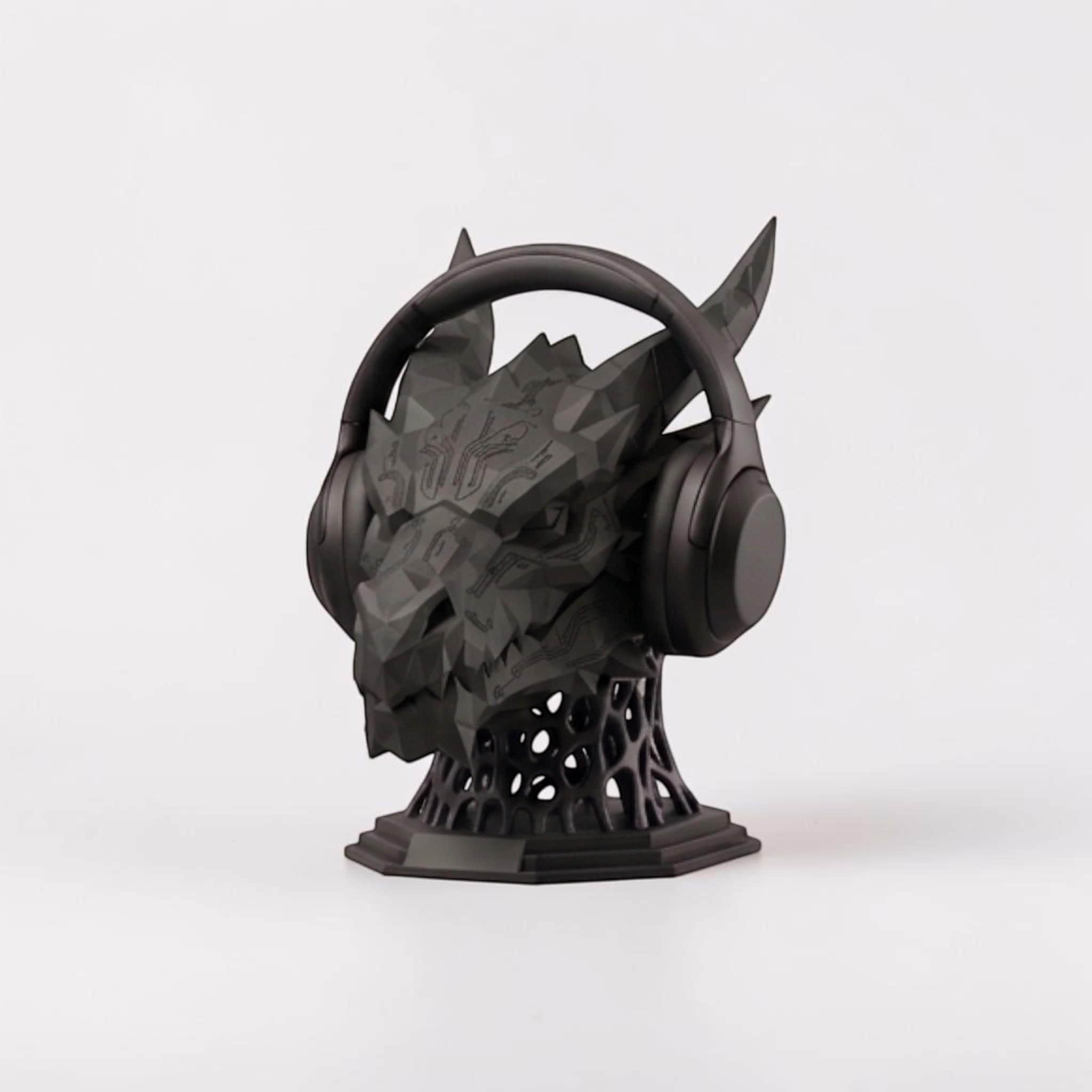 Happy3dWorld matte black 3D printed dragon headset stand with geometric sci-fi design and lattice base
