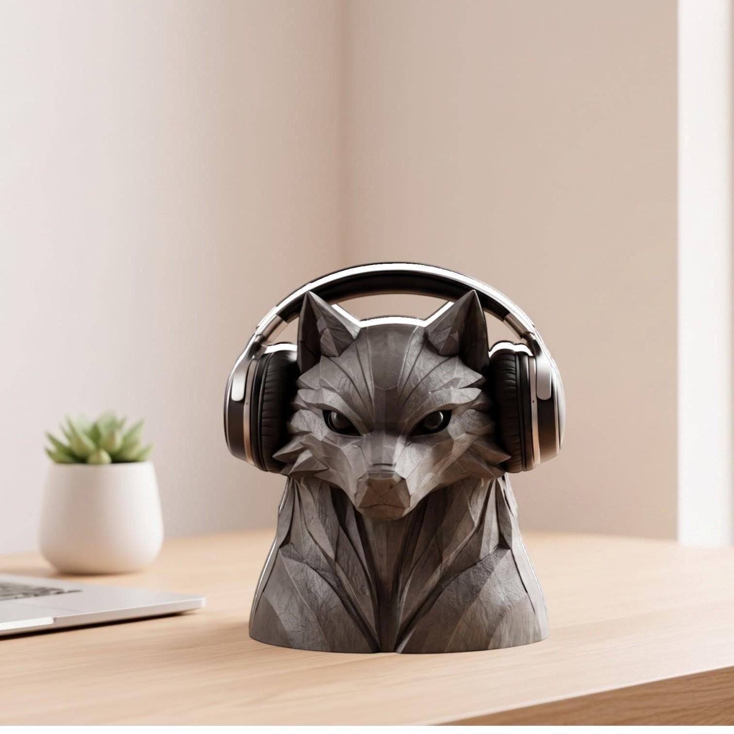 Happy3dWorld grey geometric wolf headphone stand holding gaming headset on a wooden desk