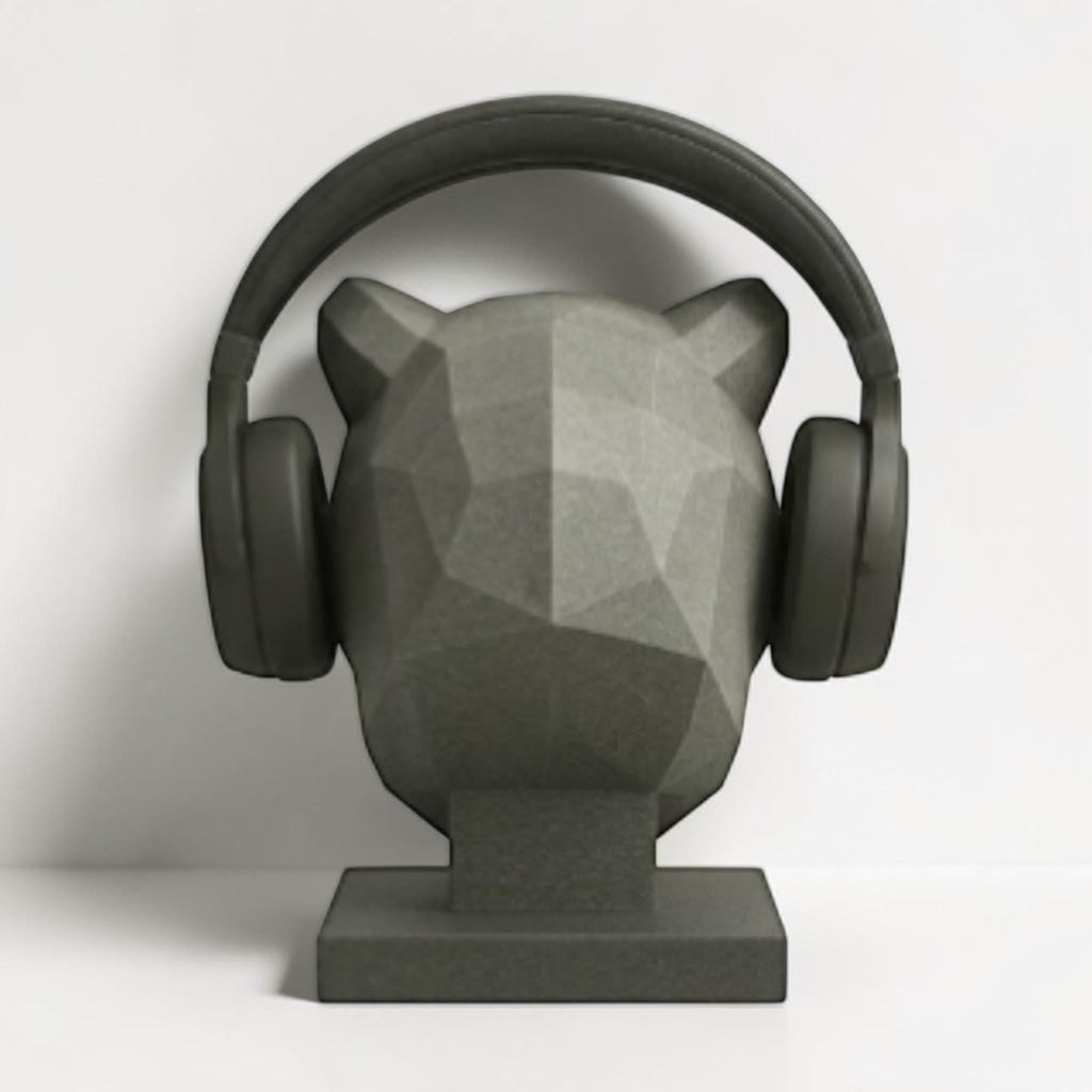 Happy3dWorld gray low-poly geometric tiger headphone stand holding black over-ear gaming headset on a desk