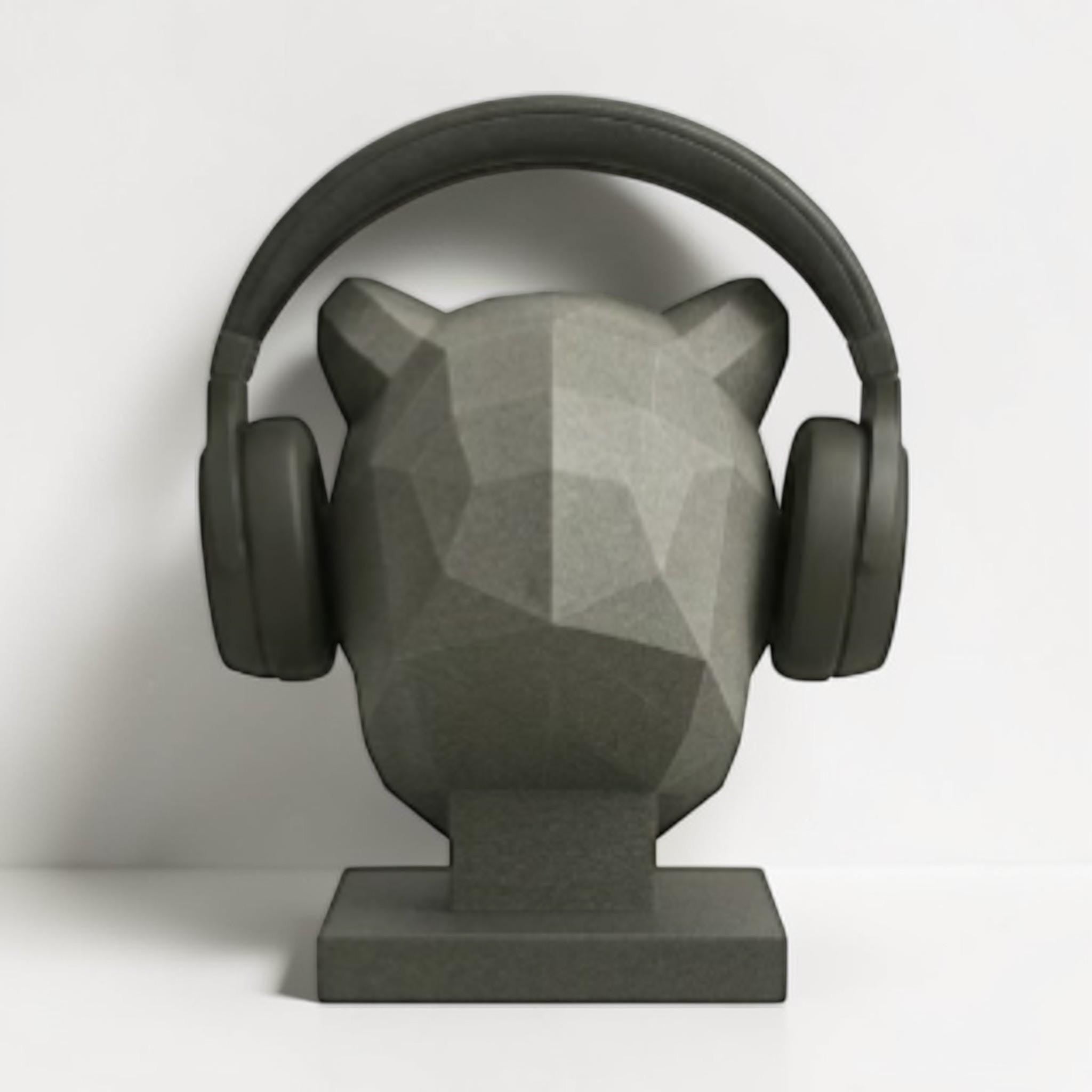 Happy3dWorld gray low-poly geometric tiger headphone stand holding black over-ear gaming headset on a desk