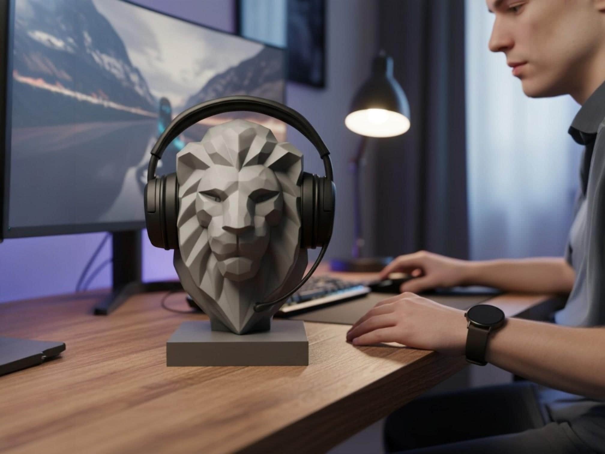 Happy3dWorld gray low-poly lion bust headphone stand on a wooden desk in a modern gaming setup
