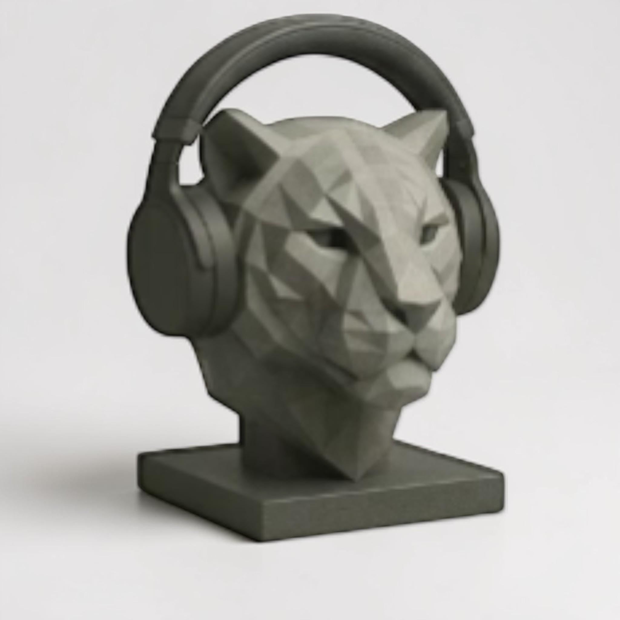 Happy3dWorld grey geometric tiger headphone stand with a low-poly design holding over-ear headphones on a desk