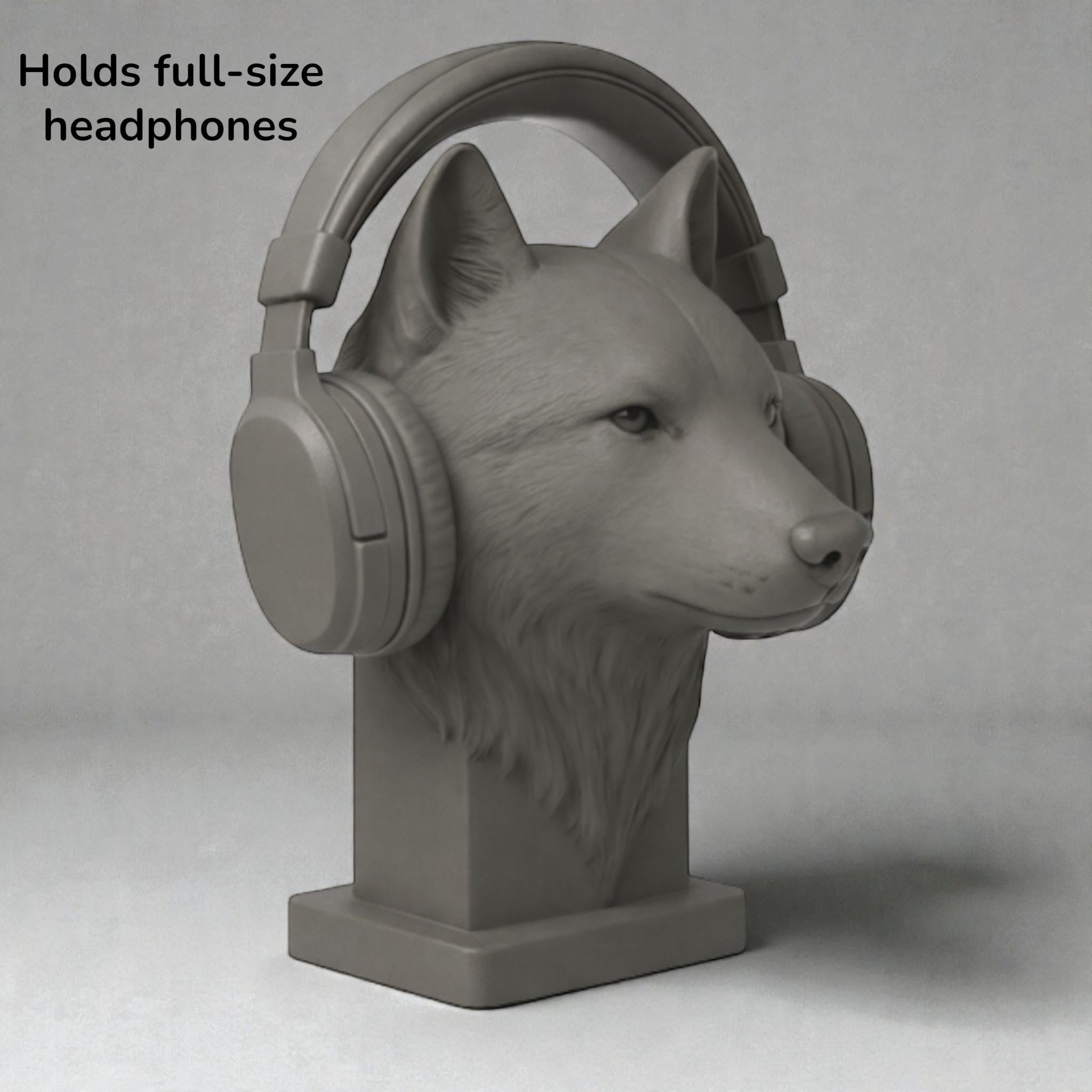 Happy3dWorld grey 3D printed wolf bust headphone stand holding over-ear gaming headset on a neutral background