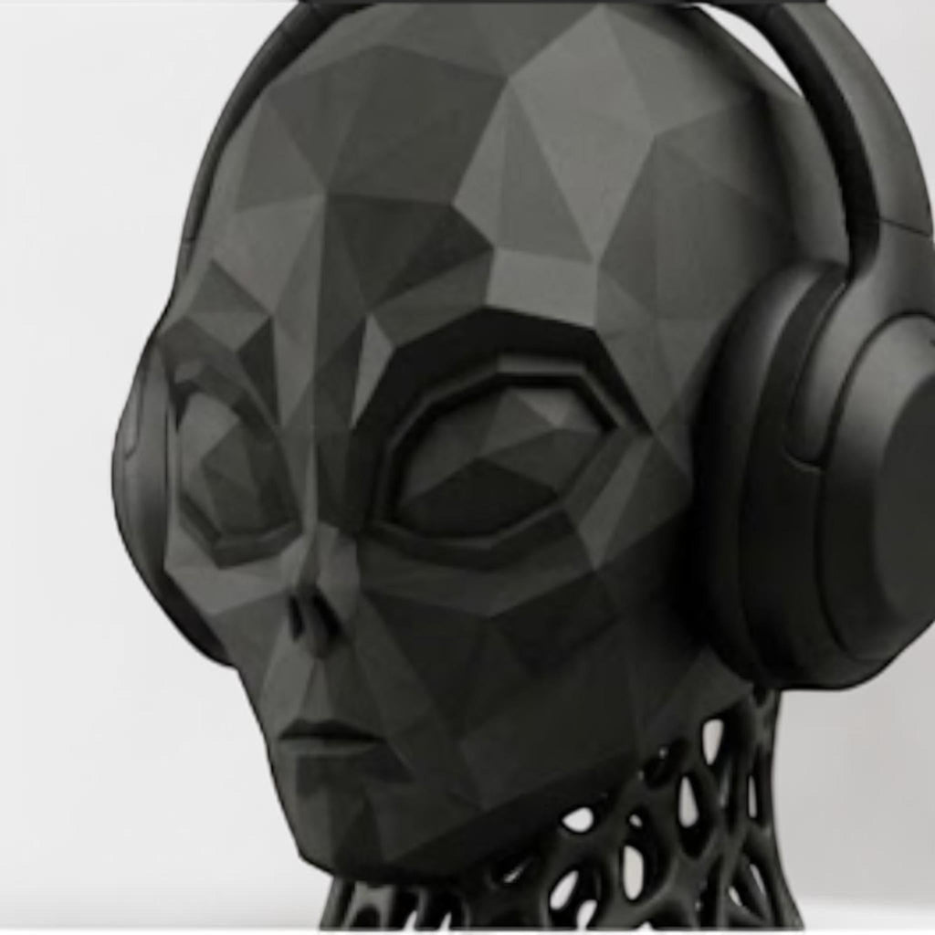 Happy3dWorld matte black low-poly alien headphone stand with a geometric voronoi neck holding over-ear headphones.