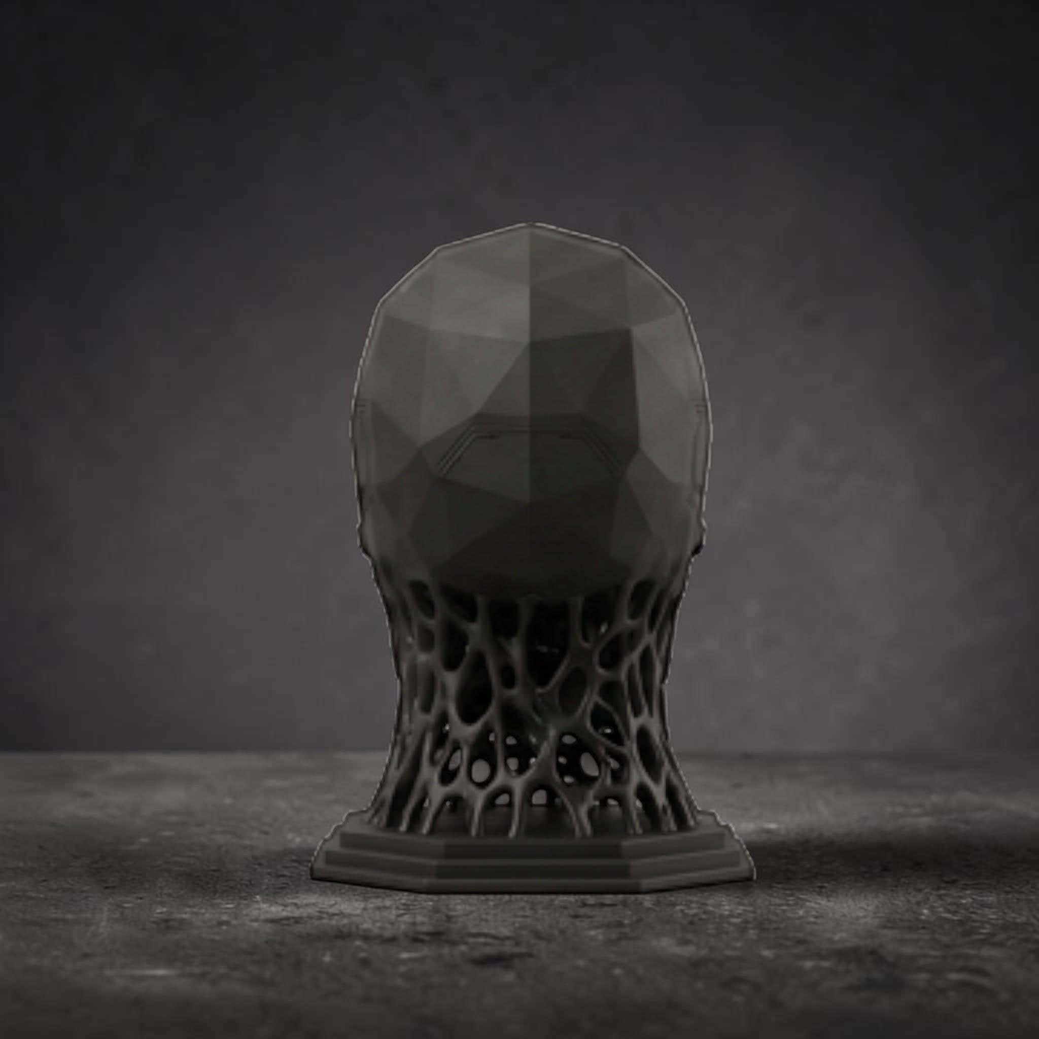 Happy3dWorld matte black mechanical skull headphone stand with a geometric design and bio-mechanical base.