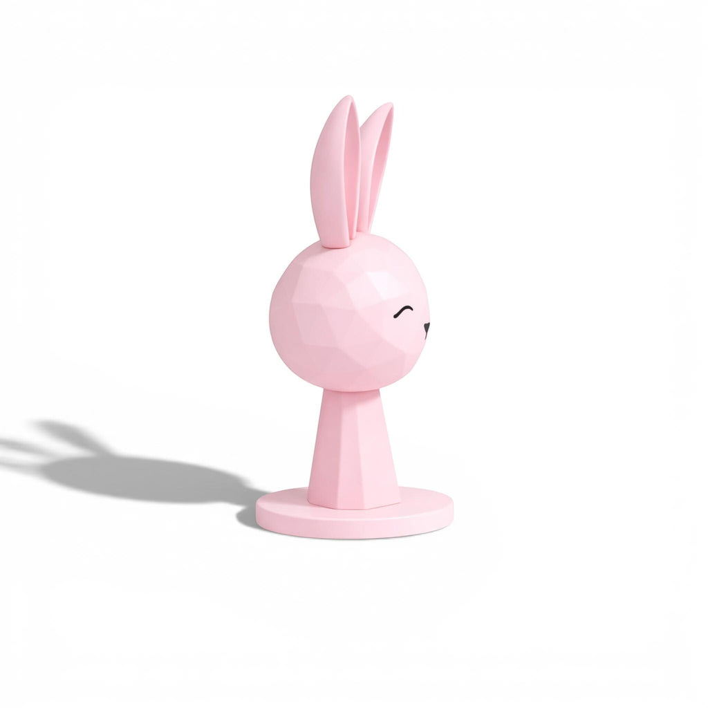 Happy3dWorld pink geometric bunny headphone stand with a low-poly rabbit design for kawaii gaming desk setups.
