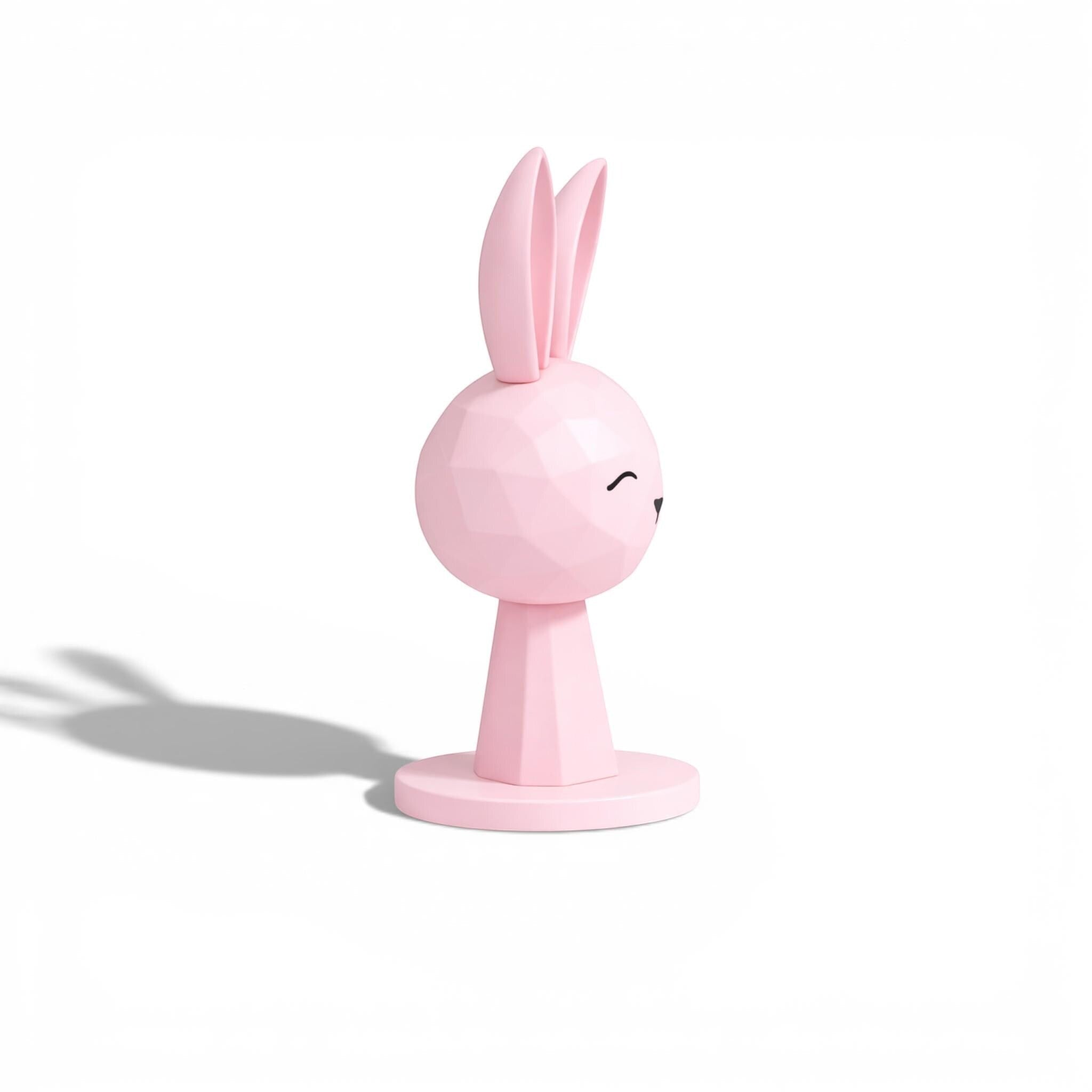 Happy3dWorld pink geometric bunny headphone stand with a low-poly rabbit design for kawaii gaming desk setups.