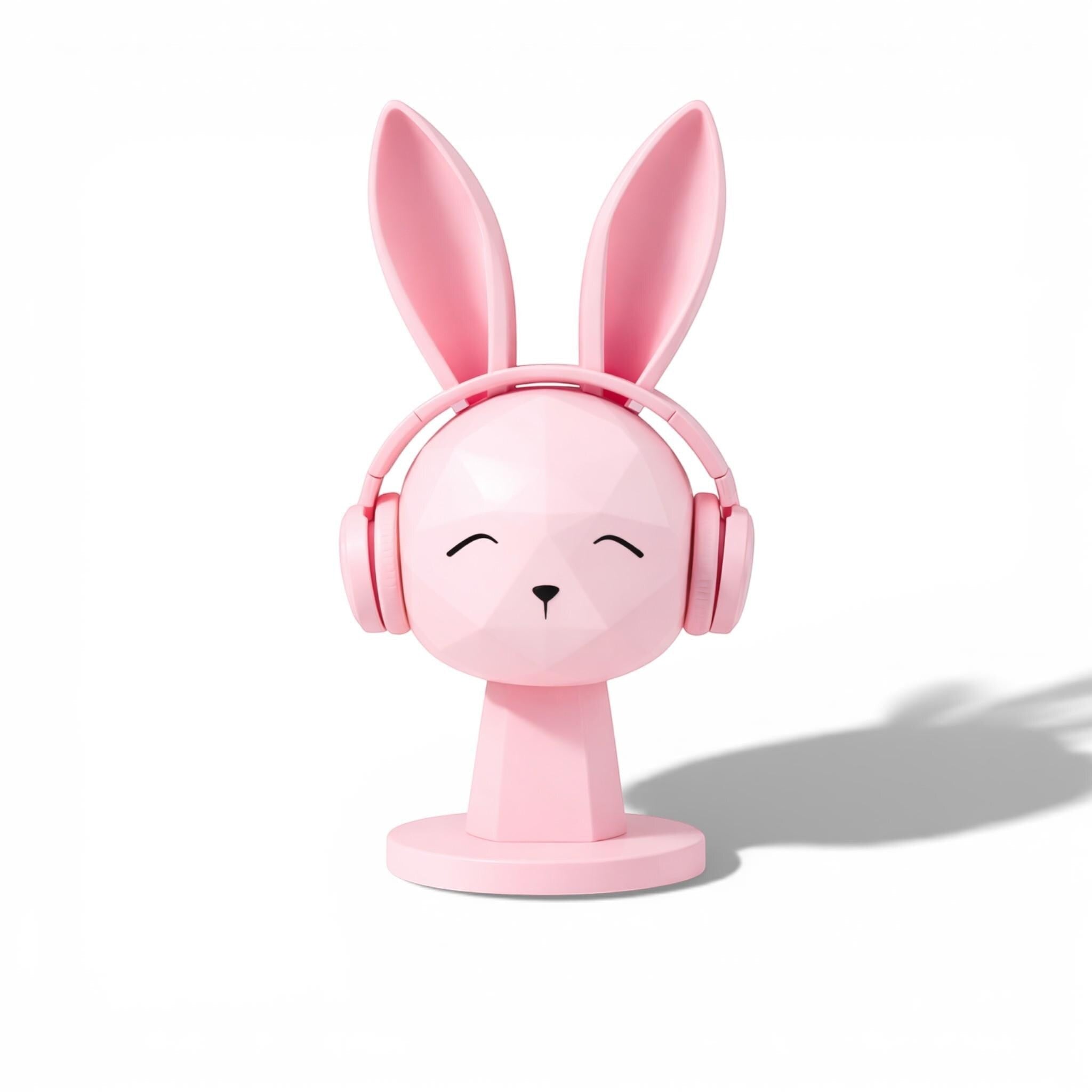 Happy3dWorld pink geometric bunny headphone stand with a low-poly rabbit design for kawaii gaming desk setups.