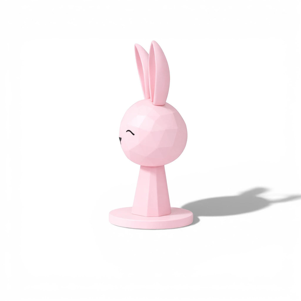 Happy3dWorld pink geometric bunny headphone stand with a low-poly rabbit design for kawaii gaming desk setups