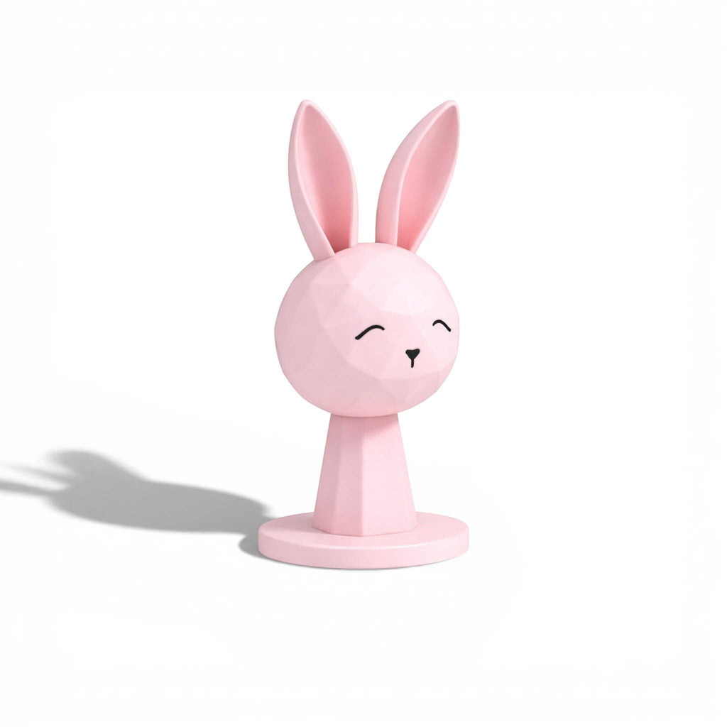 Happy3dWorld pink geometric bunny headphone stand with a low-poly rabbit design for kawaii gaming desk setups.