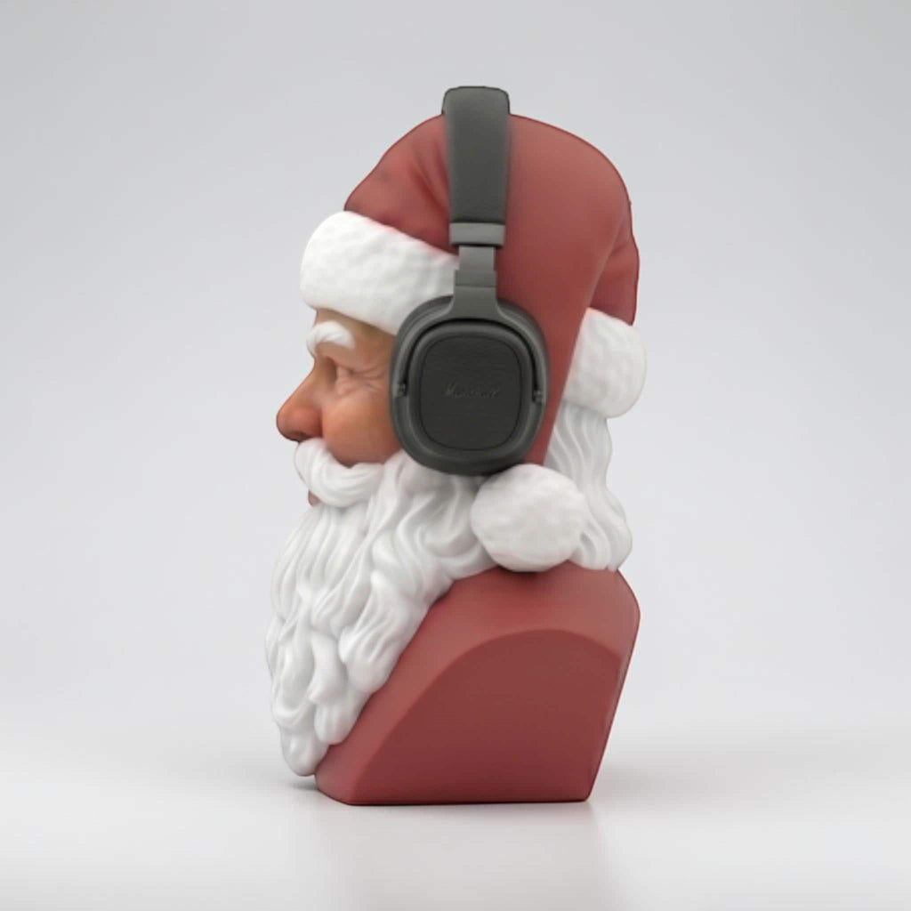 Happy3dWorld 3D-printed Santa bust wearing black over-ear headphones, featuring red and white PLA festive decor.