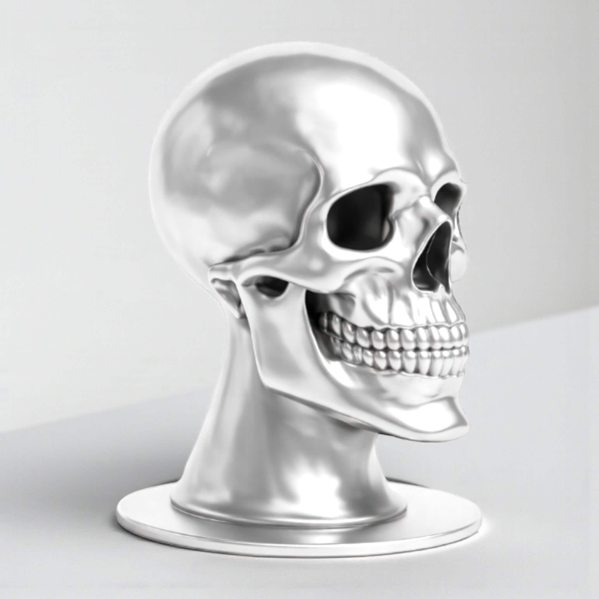Happy3dWorld silver chrome skull headphone stand with a smooth metallic finish for gaming desk organization.