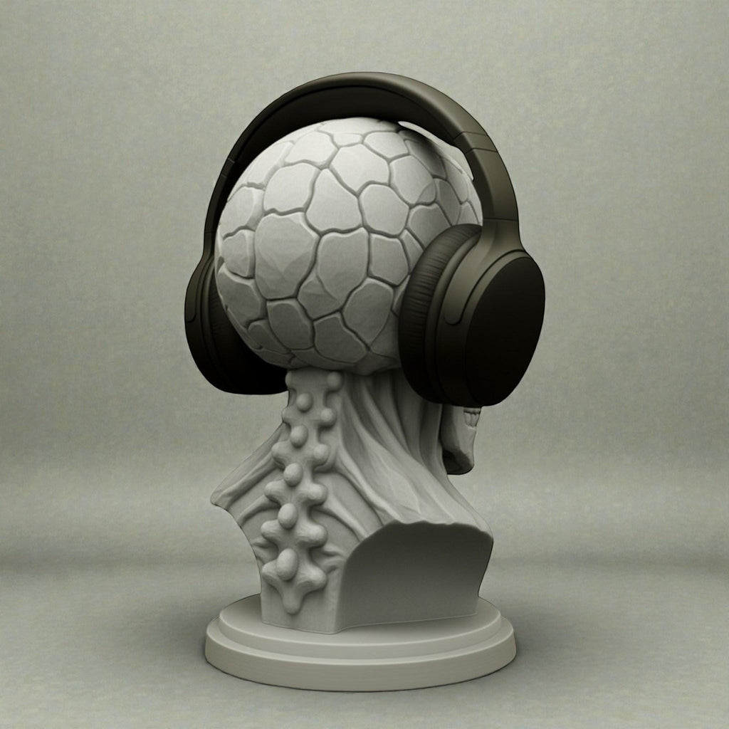Happy3dWorld cyberpunk skull headphone stand with a textured brain design holding black over-ear gaming headphones.