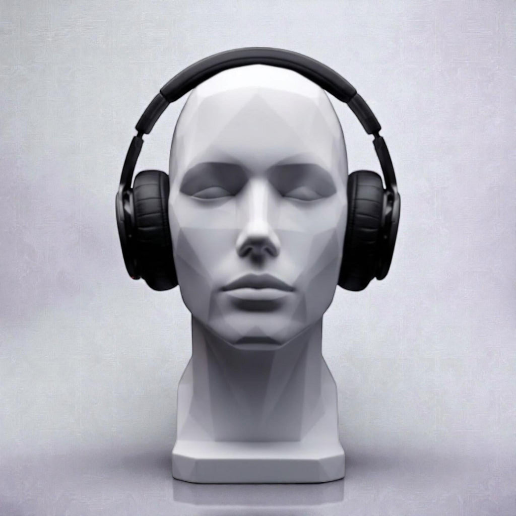 Happy3dWorld minimalist white human bust headphone stand displaying black over-ear headphones on a desk